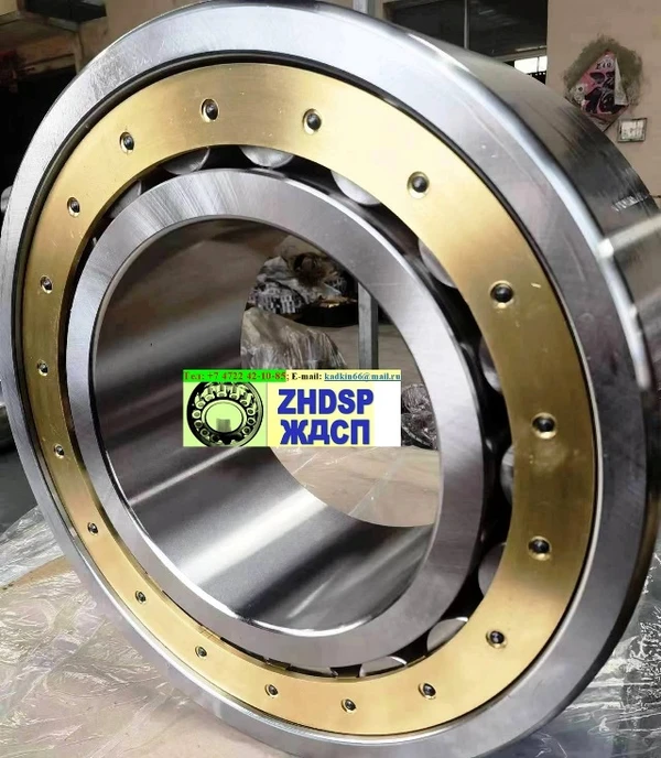 Фото Подшипник 3004264 М дробилок ДРО-609А или ДЩ-8х10. Внутреннее кольцо без реборда. 18 роликов, клёпки на всех- утоплены в потай