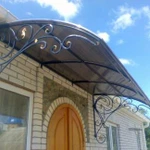 Фото №4 Козырьки кованые над дверью