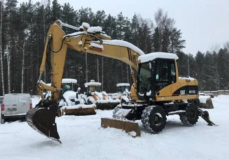 Фото Экскаватор колесный полноповоротный Caterpillar M313C