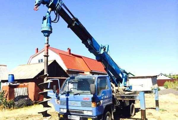 Фото Бурение под сваи. Ямобур