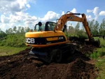 Фото №4 Колесный экскаватор JCB JS 160W