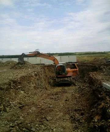 Фото Услуги эксковатора