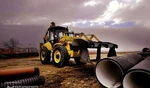 фото Экскаваторы-погрузчики New Holland B115B