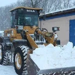 Уборка чистка вывоз снега. Фронтальный погрузчик