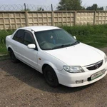 Аренда авто Mazda Familia 2002