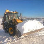 Уборка снега Экскаватором-погрузчиком JСВ  в Ревде