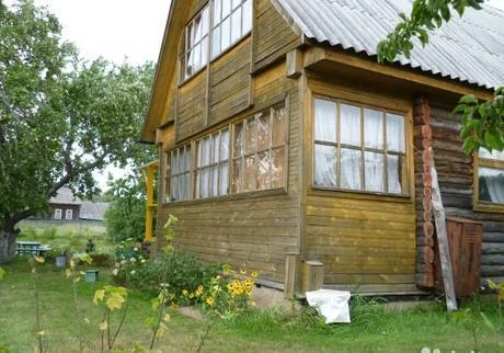 Фото Дом в деревне на берегу реки