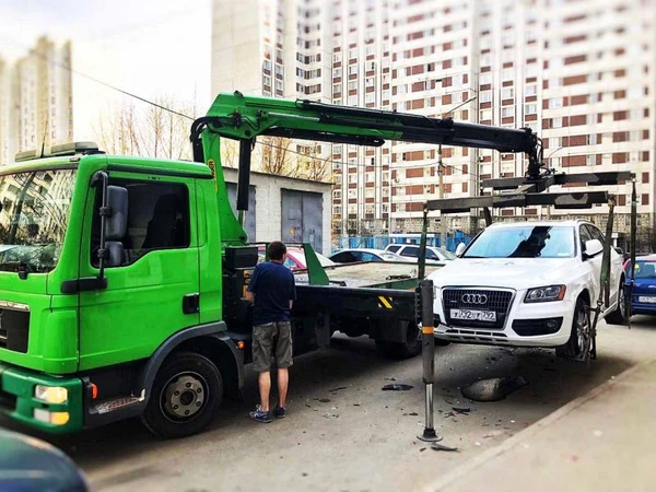 Фото Эвакуатор-Манипулятор с краном 