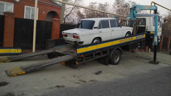 Фото Манипулятор эвакуатор