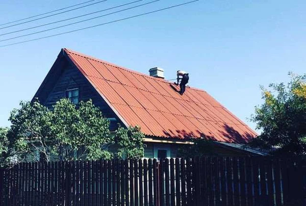 Фото Покраска крыш и фасадов в Гатчинском районе