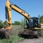 Услуги Полноповоротного экскаватора CAT 315 D