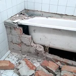 Фото №2 Вывоз старой плитки в мешках после ремонта ванной