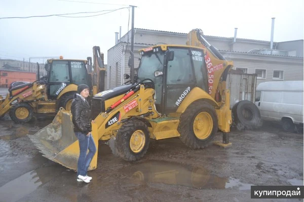 Фото Экскаватор-Погрузчик CAT Гидромолот