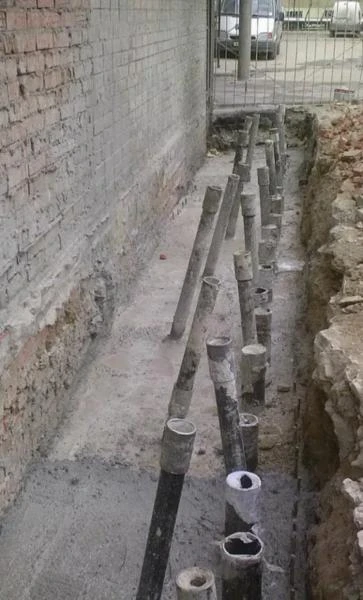 Фото Устранение проседания дома, укрепление фундамента без копки