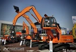 фото Экскаватор Doosan DX225LCA (металлоперегружатель)