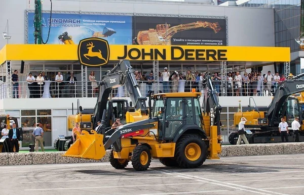 Фото Экскаватор погрузчик John Deere 325 SК