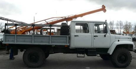 Фото Установка ЛЭП опор. Бурильно-крановой машиной БКМ-317