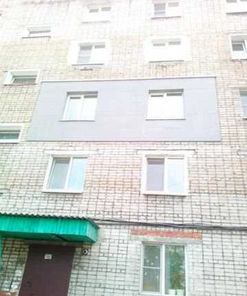 Фото Утепление фасада. Альпинисты