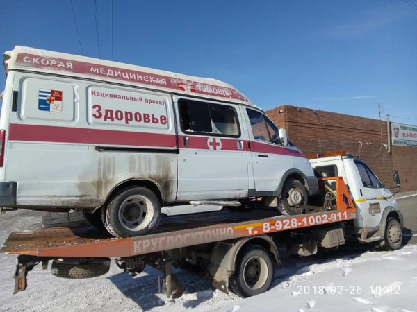 Фото Услуги эвакуатора 911