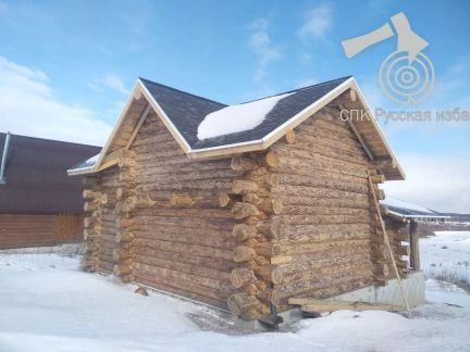 Фото Срубы ручной рубки из бревна (Зимний лес)