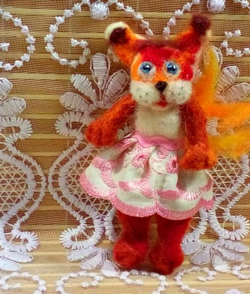 Фото Карманная игрушка Белочка