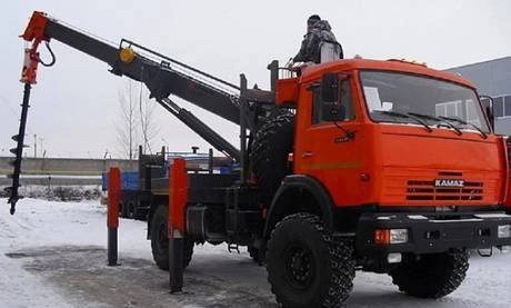 Фото Бурение под столбы. Ямобур на базе Камаз.