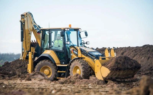 Фото  Услуги Экскаватора- погрузчика Caterpillar!