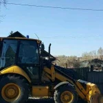 Услуги экскаватора-погрузчика CAT428, гидромолот