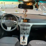 Фото №12 Opel Astra, 2010