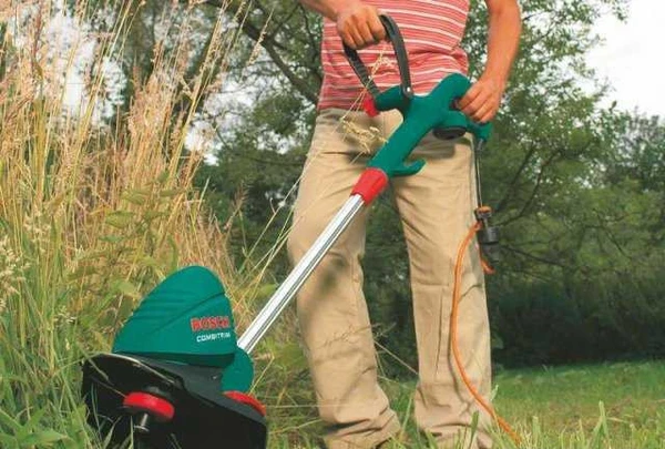 Фото Ремонт триммеров (электро и бензо газонокосилок)