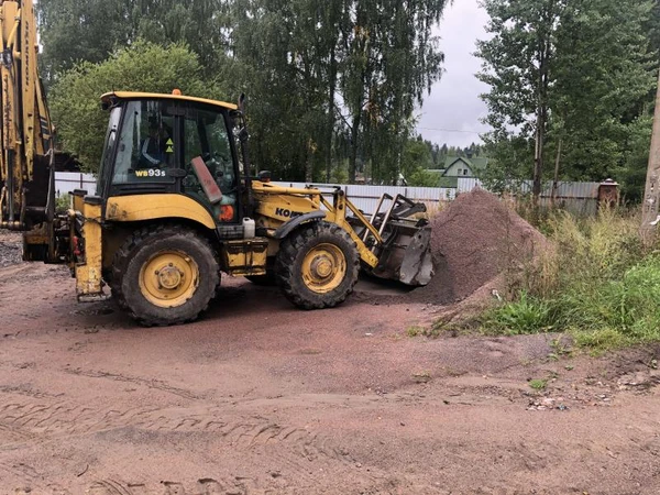 Фото Услуги экскаватора-погрузчика.