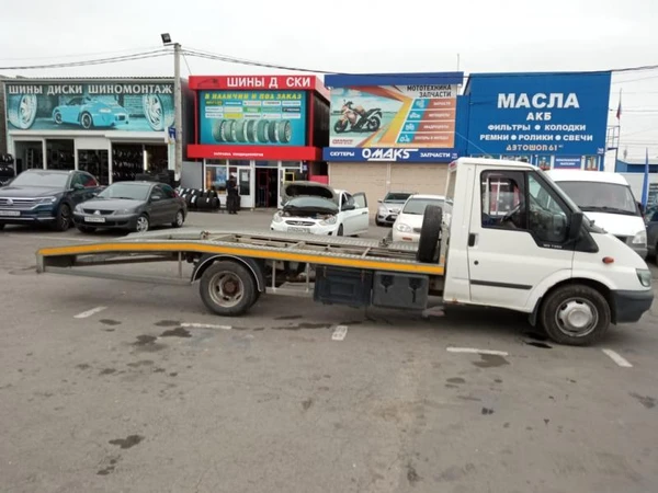 Фото Услуги эвакуатора до 2 тонн