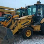 Услуги экскаватора погрузчика Komatsu, гидромолота