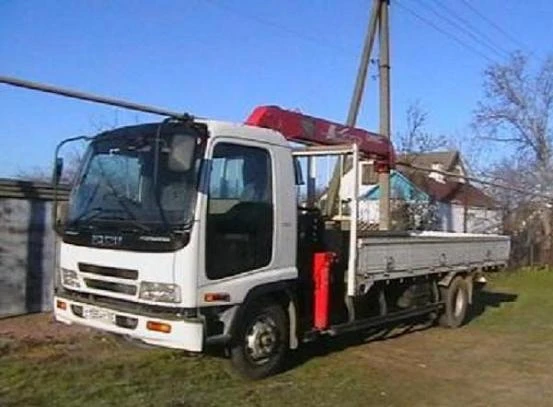 Фото Манипуляторы и бортовые автомобили . Автокраны до 32 тонн.