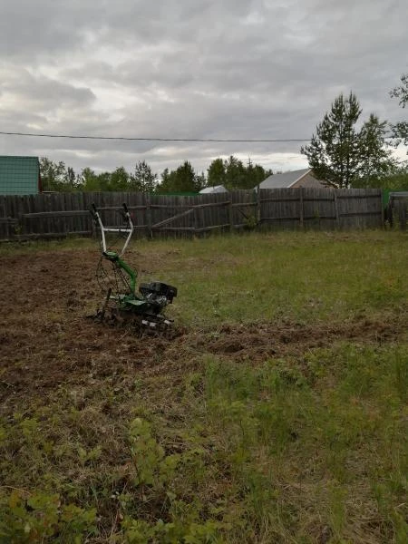 Фото Вспашка земли в Сургуте