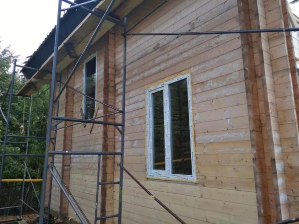 Фото Покраска  дома из бруса