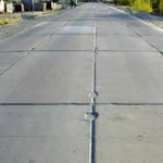 фото Укладка дорожных плит, Устройство дорог и площадок