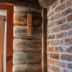 фото Внутренняя отделка бани полубревном из сосны кело