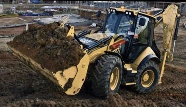 Фото Аренда экскаватора- погрузчика CAT 444F