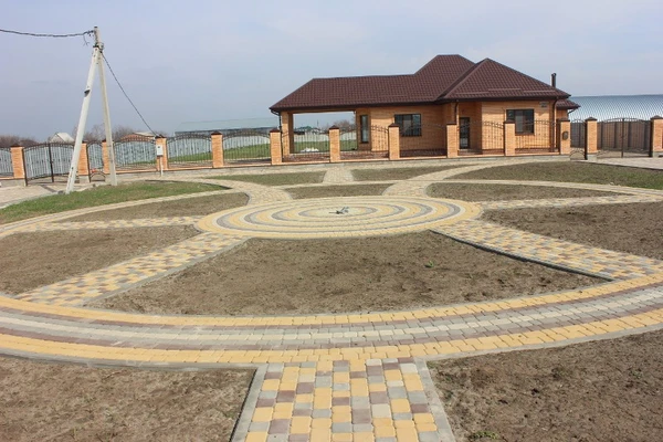 Фото Укладка тротуарной плитки
