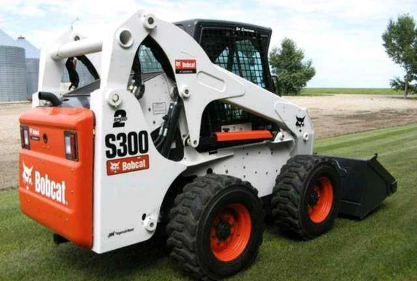 Фото Работы погрузчиком Bobcat бобкэт бобкат бобкет