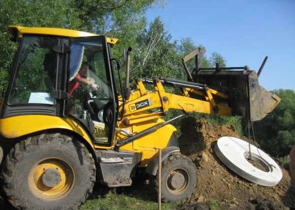 Фото JCB 3CX экскаватор-погрузчик