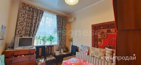 Фото Комната в 6-к 80 м2, 1 эт., 2 эт. дом