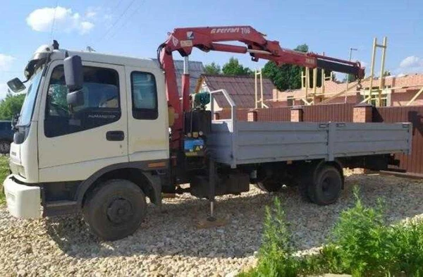 Фото Манипулятор грузоперевозки 