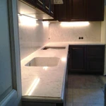 Фото №2 Каменные столешницы, подоконники, ступени,лестницы,камины,арки, изделия из камня