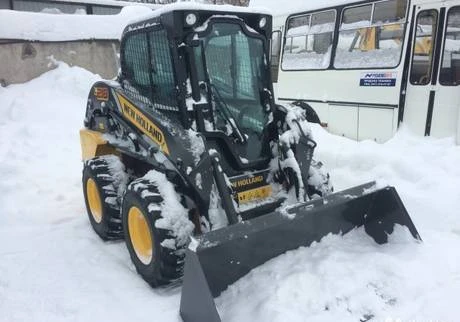 Фото Мини-погрузчик New Holland L218