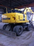 фото Колёсный экскаватор Komatsu PW 160