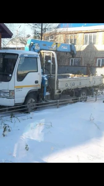 Фото Услуга манипулятора фискарс Пойковский