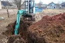 Фото Отсыпка ям, болот и поднятие участка