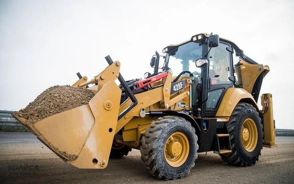 Фото Погрузчик-экскаватор Caterpillar 428 F2
